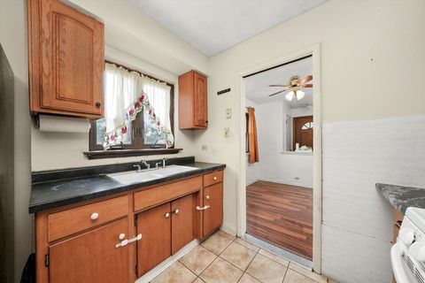 Tiny photo for 1003 W Hillside Drive, Bensenville, IL 60106 (MLS # 12464309)