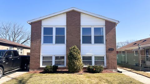 Photo of 12741 S Manistee Avenue, Chicago, IL 60633 (MLS # 12590376)