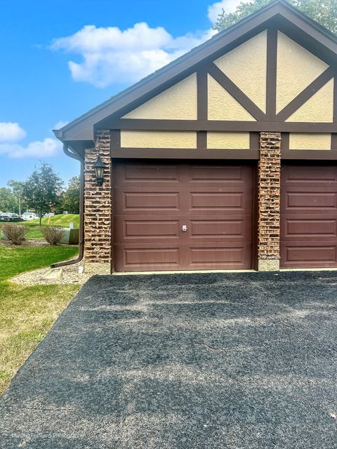 Tiny photo for 1701 Lakecliffe Drive #D, Wheaton, IL 60189 (MLS # 12497944)