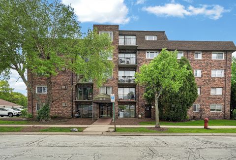 Photo of 7117 W 93rd Street #405, Oak Lawn, IL 60453 (MLS # 12636324)