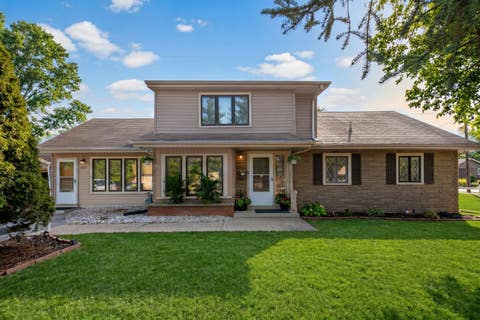 Photo of 10715 Diversey Avenue, Melrose Park, IL 60164 (MLS # 12707316)