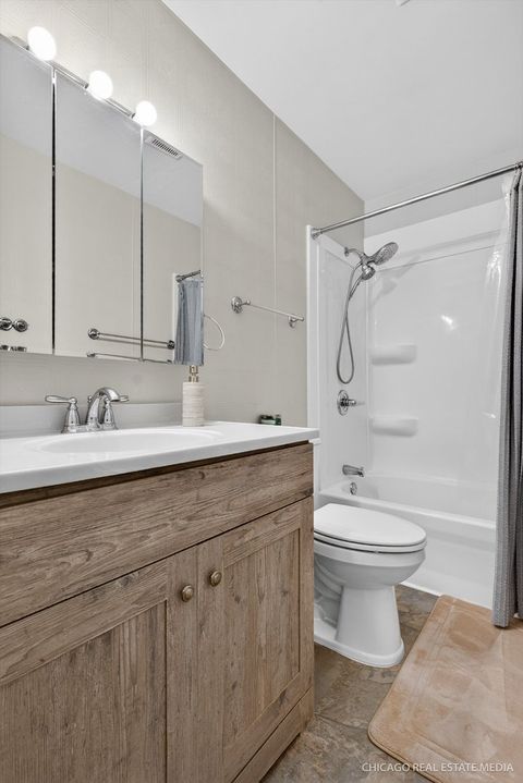 Tiny photo for 1118 Manchester Mall, McHenry, IL 60050 (MLS # 12549702)