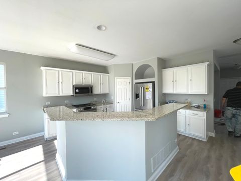 Tiny photo for 233 Pawtucket Avenue, Elgin, IL 60124 (MLS # 12462320)