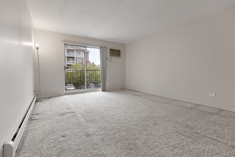 Tiny photo for 242 Shorewood Drive #1B, Glendale Heights, IL 60139 (MLS # 12490383)