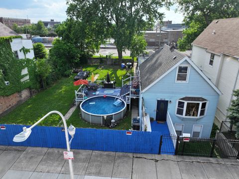 Photo of 9018 S Brandon Avenue, Chicago, IL 60617 (MLS # 12478899)