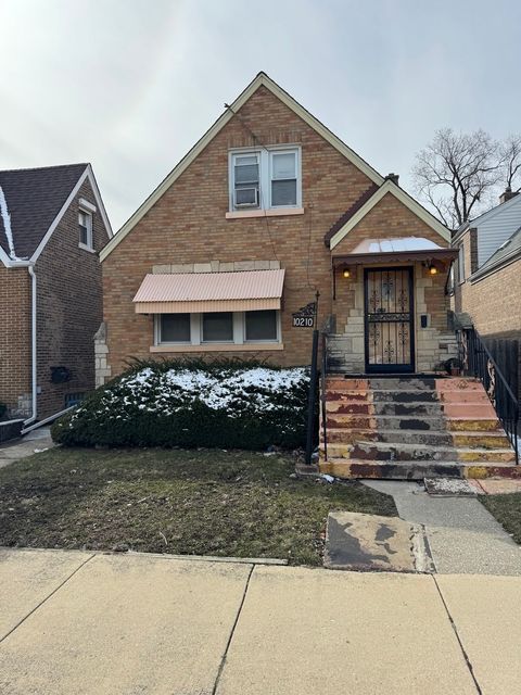 Photo of 10210 S Prairie Avenue, Chicago, IL 60628 (MLS # 12607609)