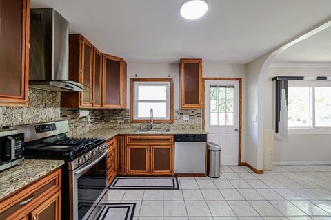 Tiny photo for 819 Robinson Avenue, Streamwood, IL 60107 (MLS # 12481378)