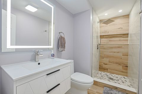 Tiny photo for 819 Robinson Avenue, Streamwood, IL 60107 (MLS # 12481378)