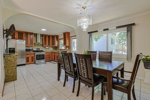 Tiny photo for 819 Robinson Avenue, Streamwood, IL 60107 (MLS # 12481378)