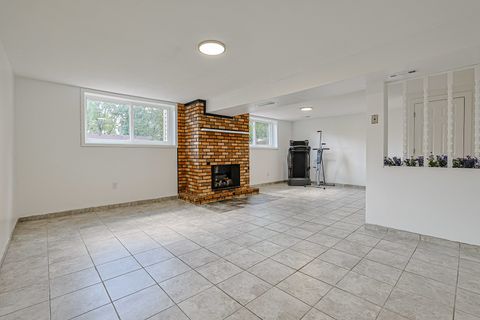 Tiny photo for 819 Robinson Avenue, Streamwood, IL 60107 (MLS # 12481378)