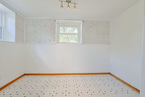 Tiny photo for 819 Robinson Avenue, Streamwood, IL 60107 (MLS # 12481378)