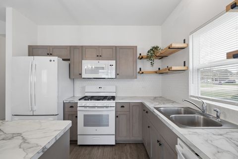 Tiny photo for 408 Holland Drive, Joliet, IL 60436 (MLS # 12626089)