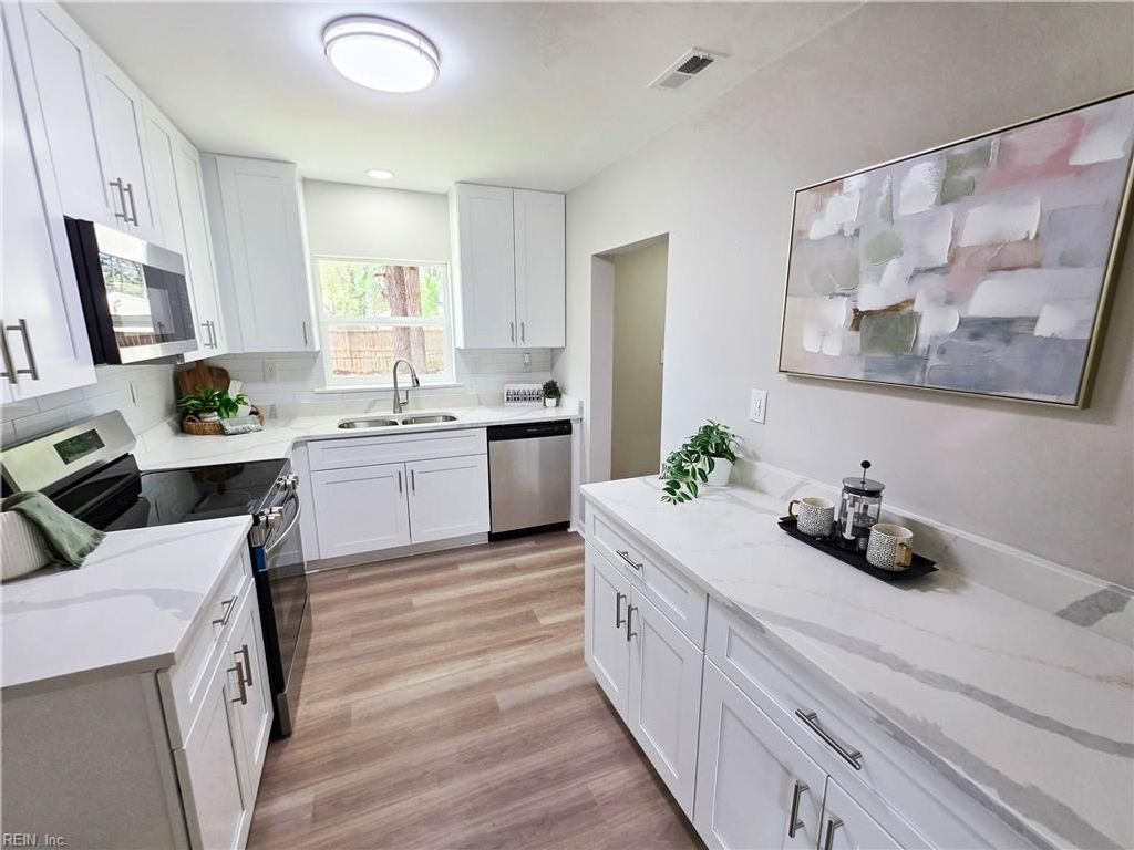 Photo of 303 Bunche Boulevard, Portsmouth, VA 23701 (MLS # 10629154)