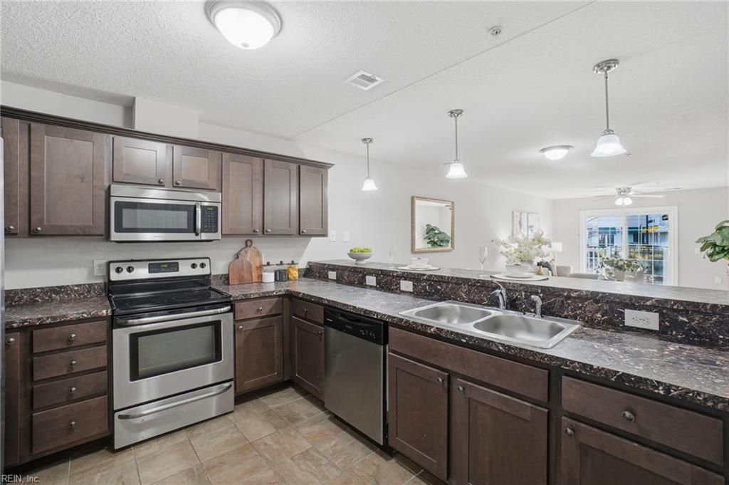 Photo of 1016 Thoroughgood Way #104, Chesapeake, VA 23324 (MLS # 10612885)