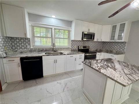 Photo of 1452 E Pembroke Ave AVE, Hampton, VA 23663 (MLS # 10654872)