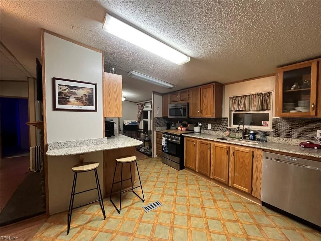 Photo of 3565 Adams Swamp Road, Suffolk, VA 23434 (MLS # 10621020)