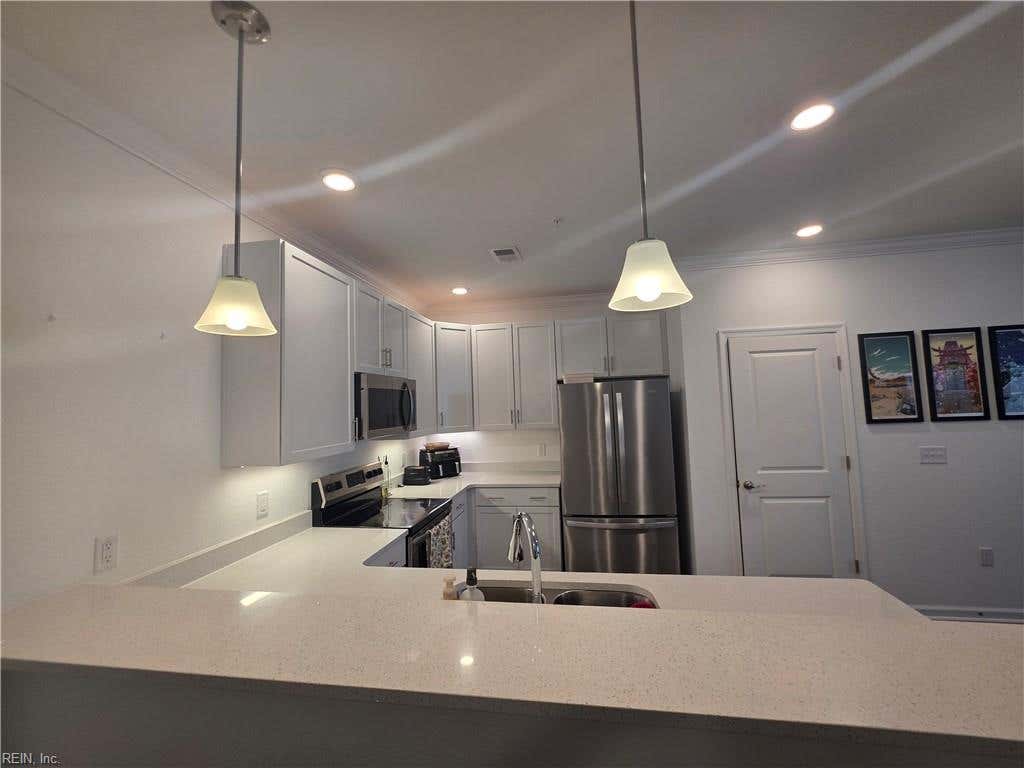 Photo of 1725 DROMOLIN Drive #203, Virginia Beach, VA 23456 (MLS # 10640994)