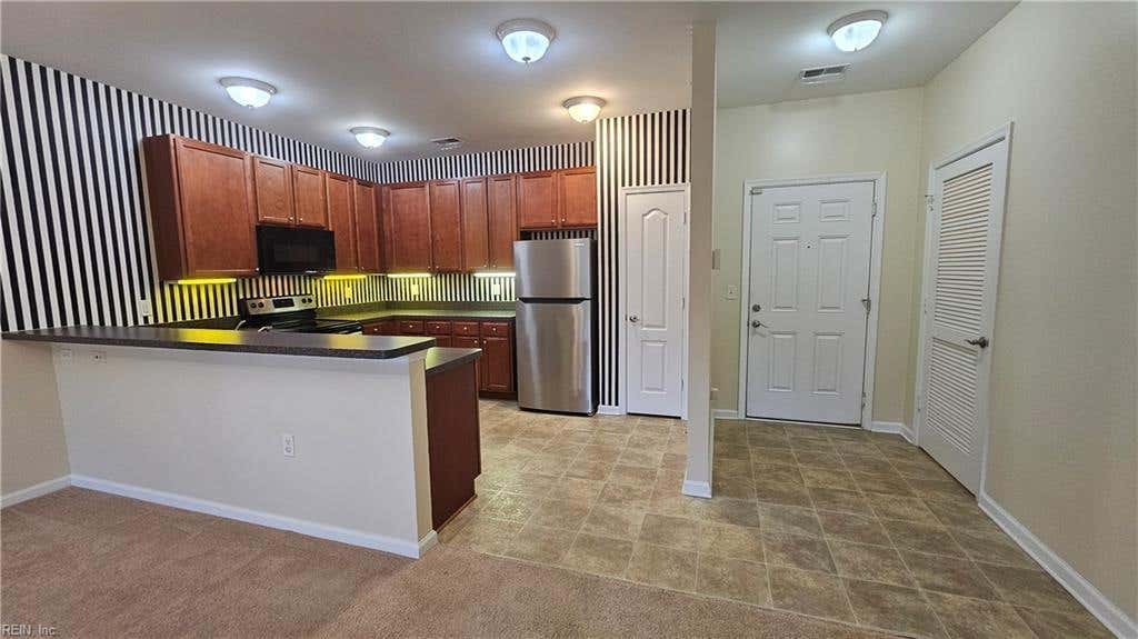 Photo of 5304 Warminster Drive #203, Virginia Beach, VA 23455 (MLS # 10647290)