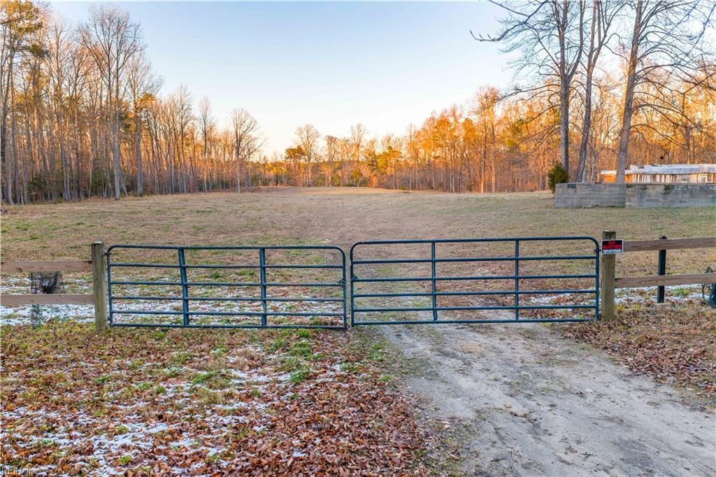 Photo of 9744 Runninghorse Lane, Gloucester, VA 23061 (MLS # 10617600)