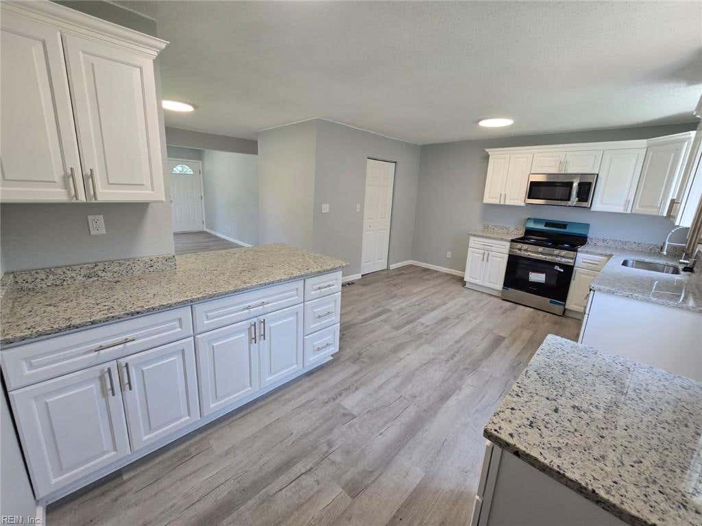 Photo of 411 Gust Lane, Portsmouth, VA 23701 (MLS # 10647778)
