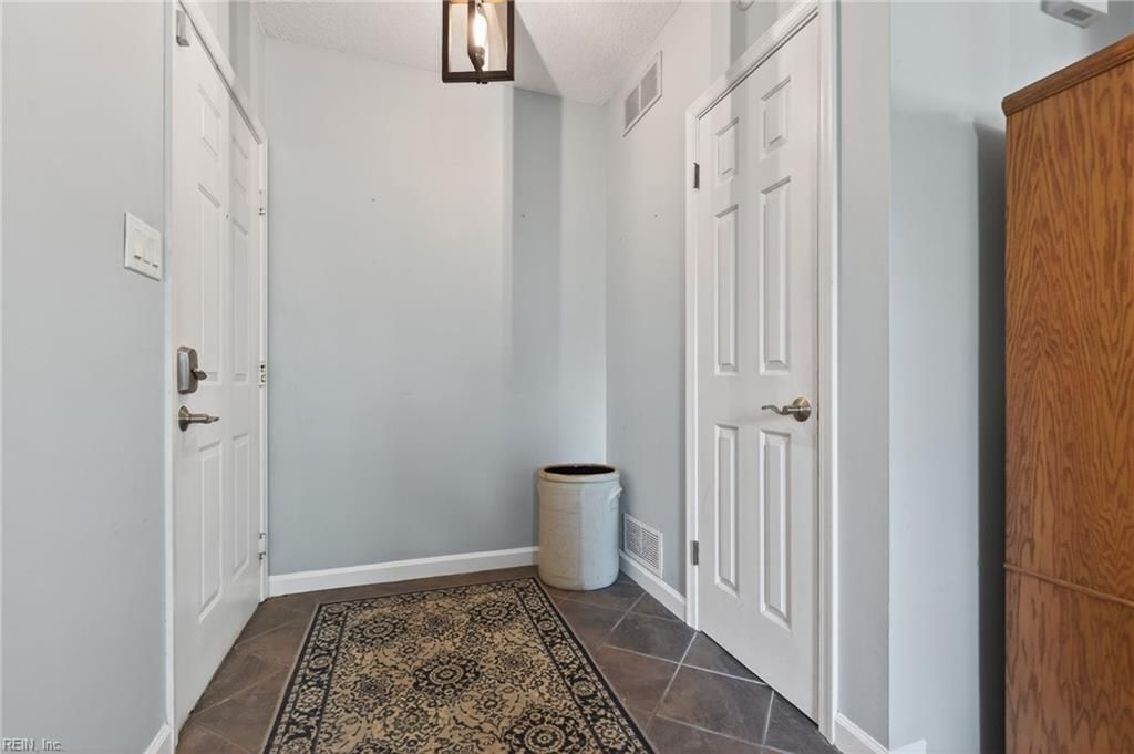 Photo of 3204 Jade Court #104, Virginia Beach, VA 23451 (MLS # 10631340)