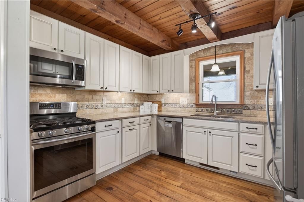 Photo of 7920 Harvest Drive, Suffolk, VA 23437 (MLS # 10629002)