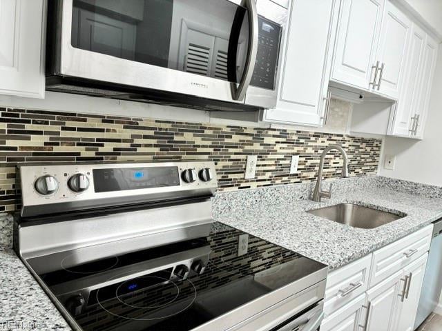 Photo of 1303 Glyndon Drive, Virginia Beach, VA 23464 (MLS # 10656169)