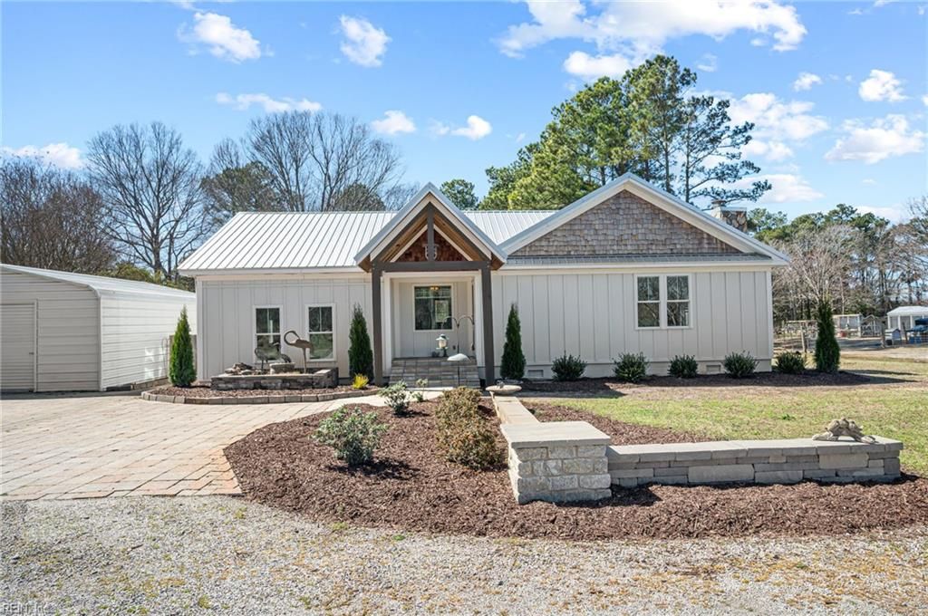 Photo of 448 Knotts Island Road, Knotts Island, NC 27950 (MLS # 10626409)