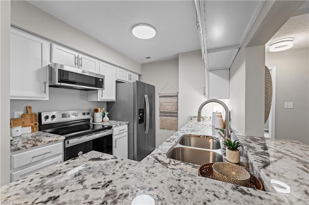 Photo of 502 Thorncliff Drive #104, Newport News, VA 23608 (MLS # 10631070)