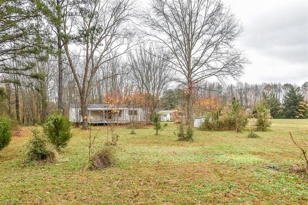 Photo of 11525 Tucker Swamp Road, Zuni, VA 23898 (MLS # 10612704)