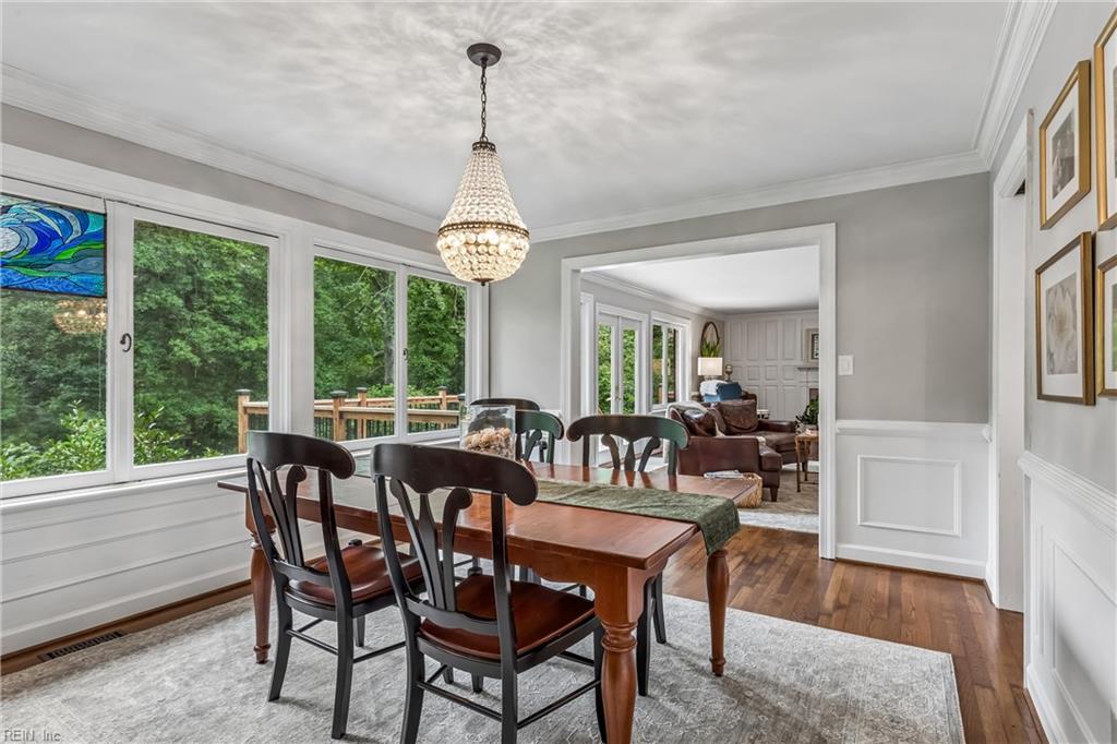 Perfectly positioned on a private, wooded .66-acre homesite overlookin – image 11