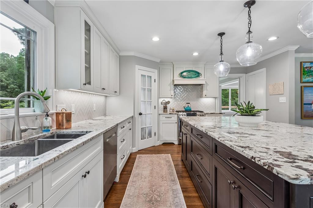 Perfectly positioned on a private, wooded .66-acre homesite overlookin – image 15