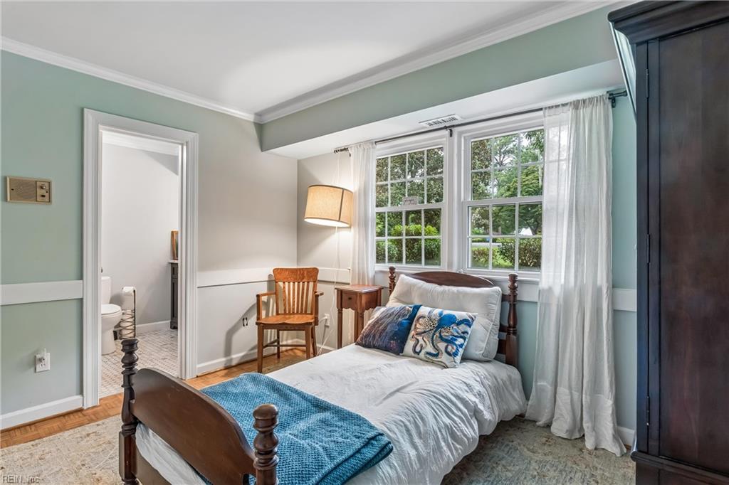 Perfectly positioned on a private, wooded .66-acre homesite overlookin – image 31