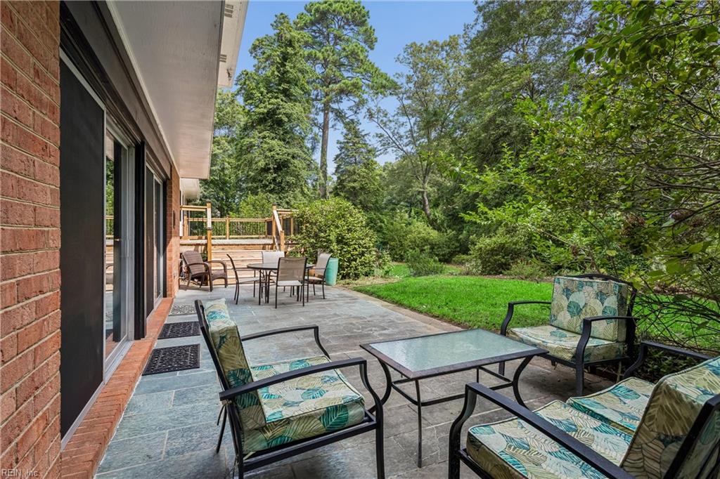 Perfectly positioned on a private, wooded .66-acre homesite overlookin – image 39