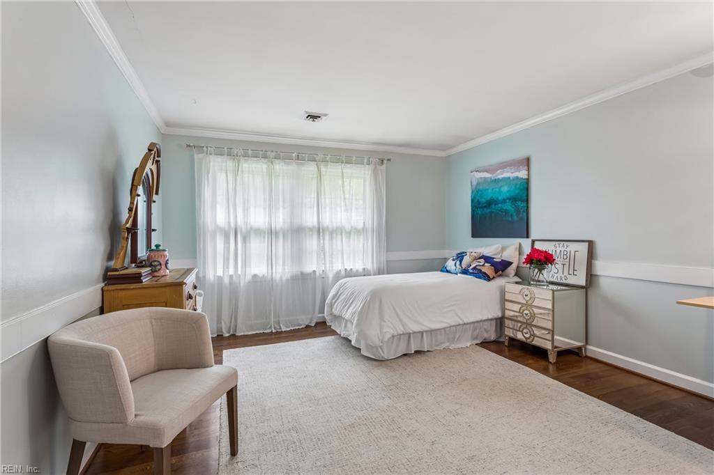Perfectly positioned on a private, wooded .66-acre homesite overlookin – image 21