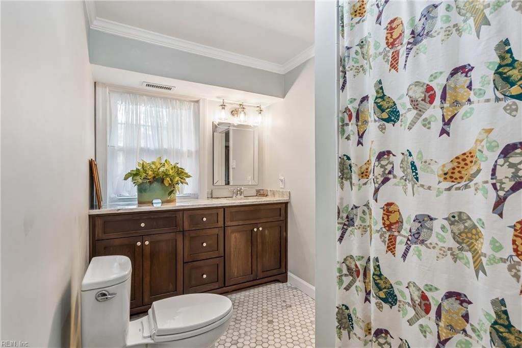 Perfectly positioned on a private, wooded .66-acre homesite overlookin – image 33