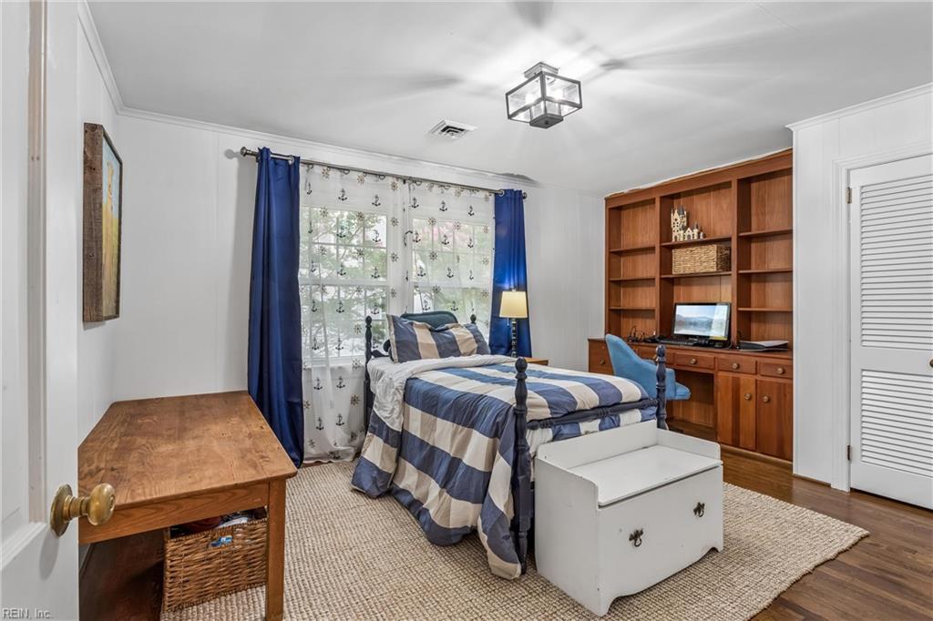 Perfectly positioned on a private, wooded .66-acre homesite overlookin – image 24