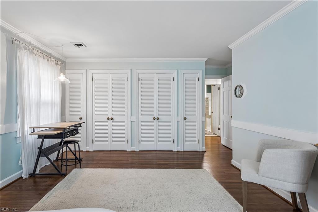 Perfectly positioned on a private, wooded .66-acre homesite overlookin – image 22