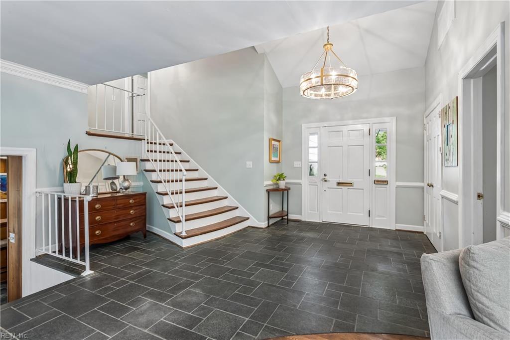 Perfectly positioned on a private, wooded .66-acre homesite overlookin – image 7