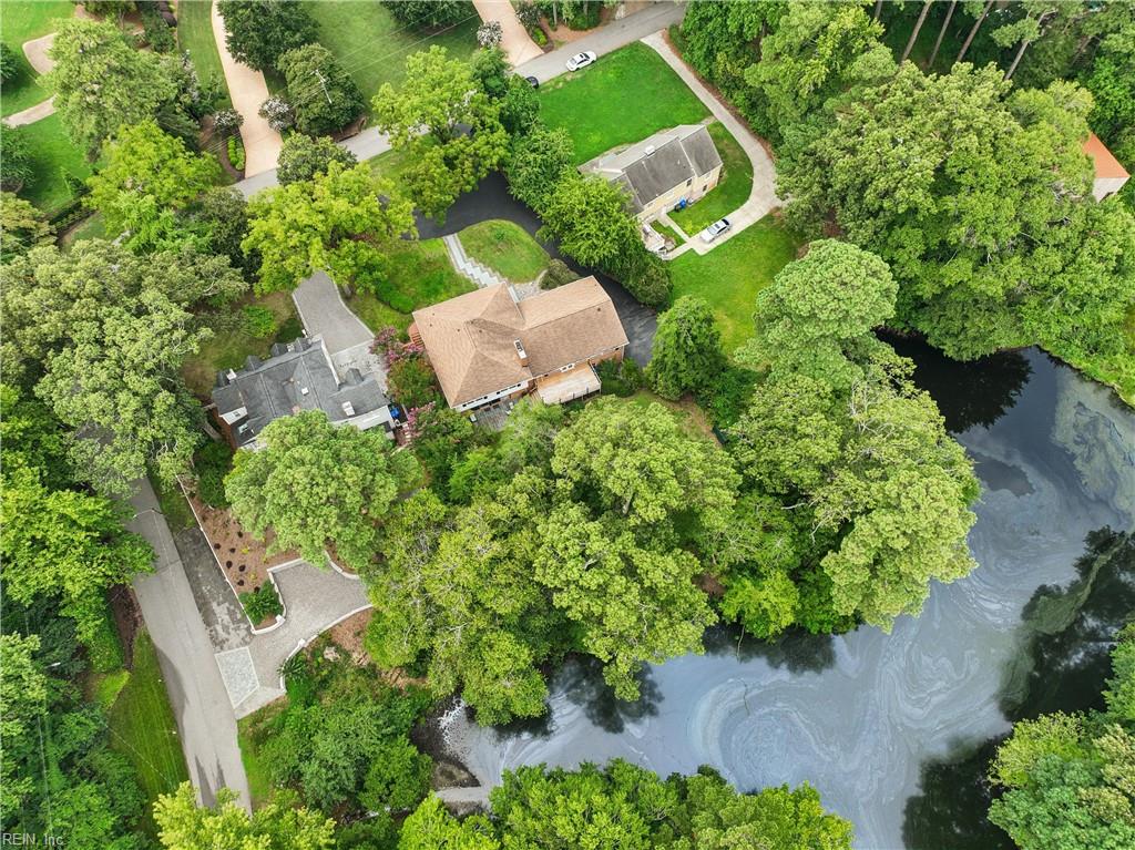 Perfectly positioned on a private, wooded .66-acre homesite overlookin – image 40