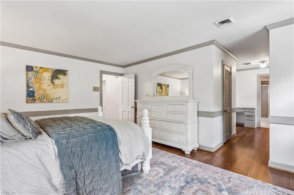 Perfectly positioned on a private, wooded .66-acre homesite overlookin – image 18