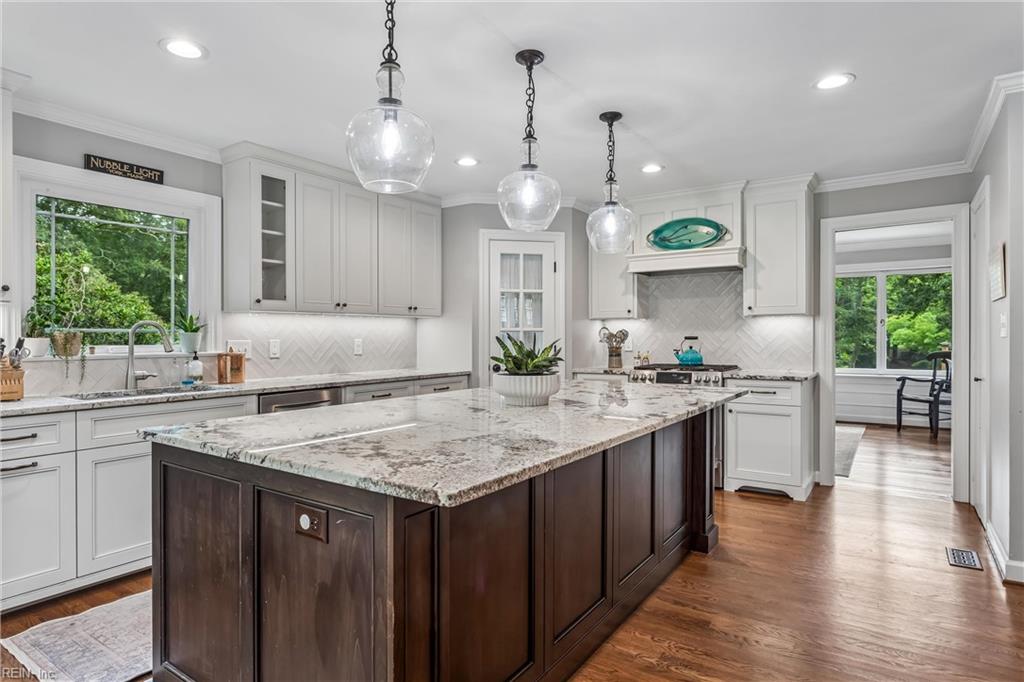 Perfectly positioned on a private, wooded .66-acre homesite overlookin – image 14