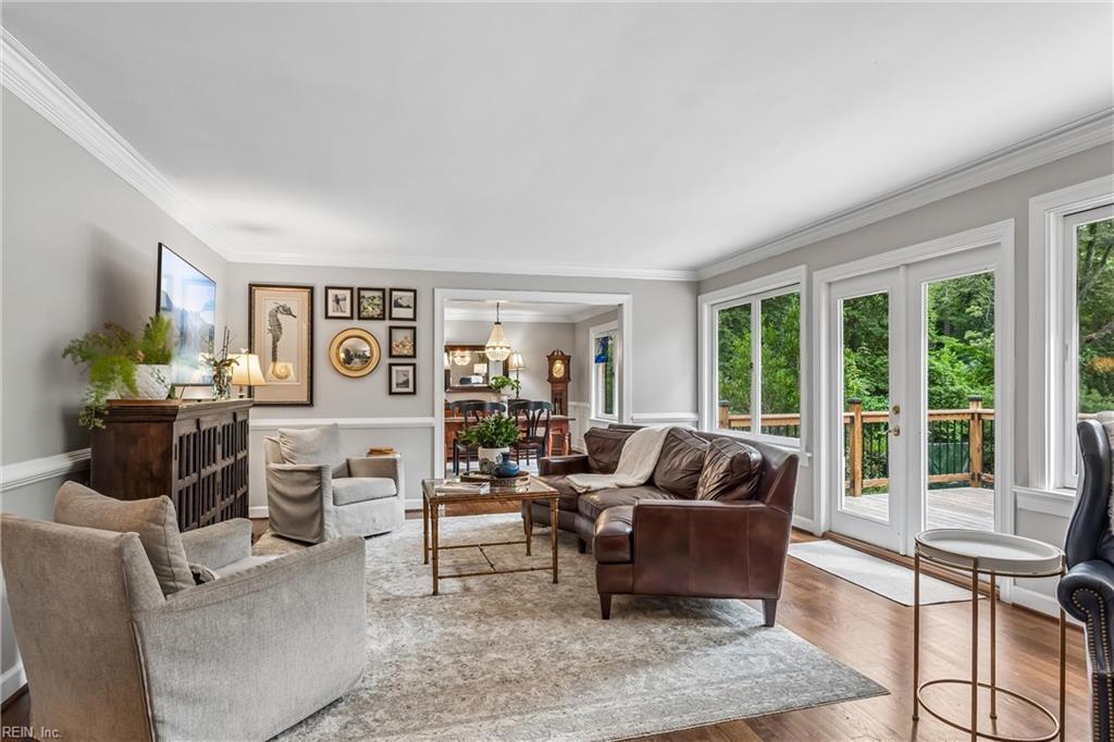 Perfectly positioned on a private, wooded .66-acre homesite overlookin – image 9