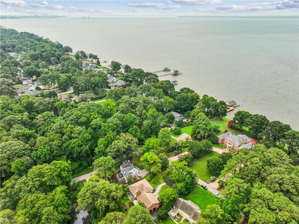 Perfectly positioned on a private, wooded .66-acre homesite overlookin – image 41