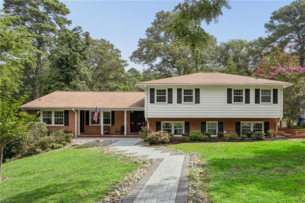 Perfectly positioned on a private, wooded .66-acre homesite overlookin – image 2