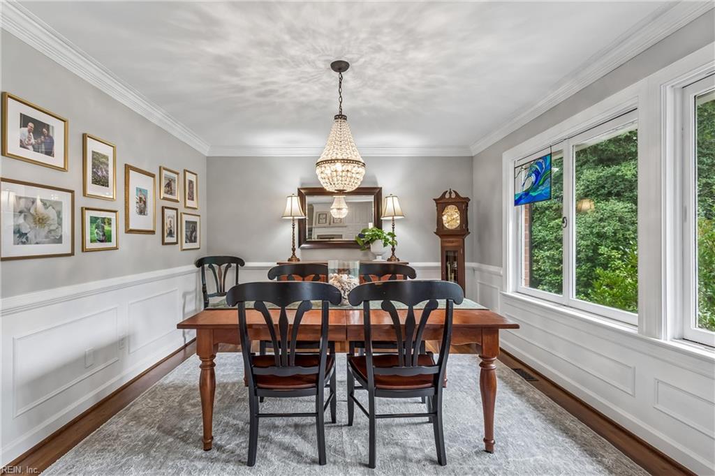 Perfectly positioned on a private, wooded .66-acre homesite overlookin – image 10