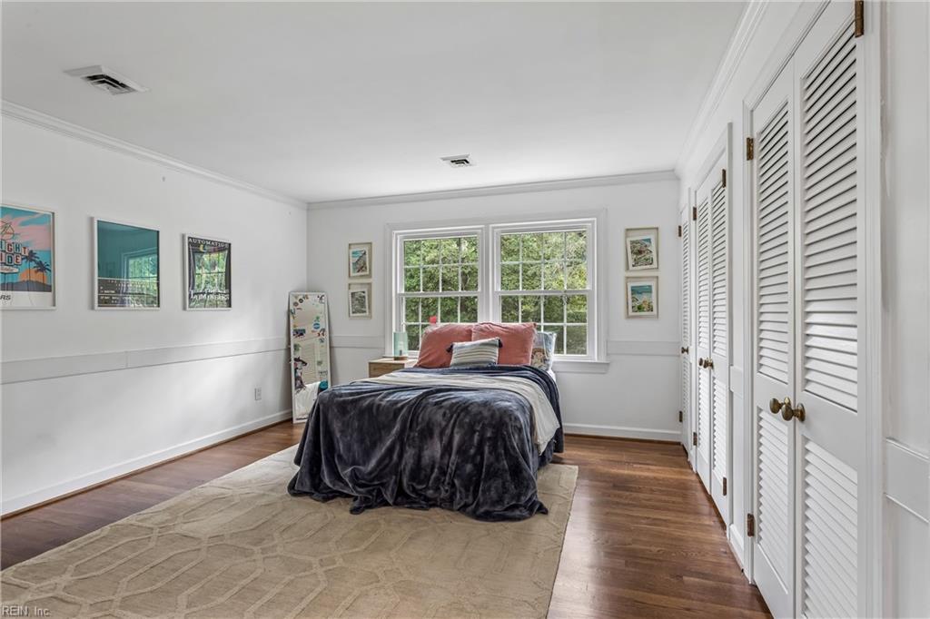 Perfectly positioned on a private, wooded .66-acre homesite overlookin – image 23
