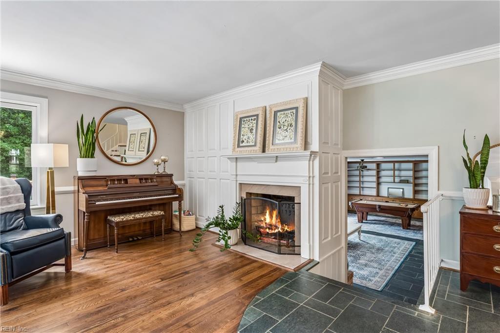 Perfectly positioned on a private, wooded .66-acre homesite overlookin – image 8