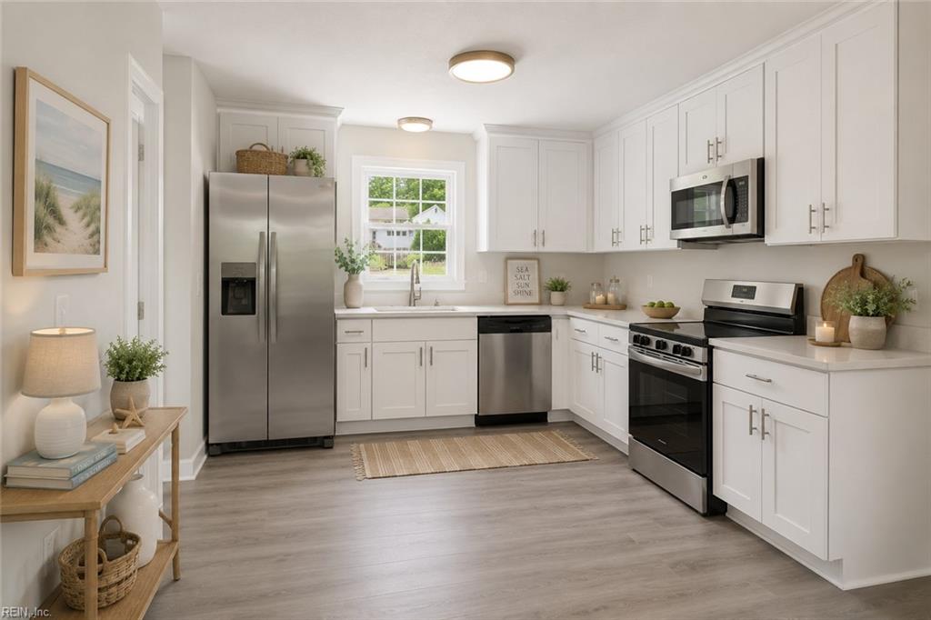 Photo of 112 W Rexford Drive, Newport News, VA 23608 (MLS # 10657289)