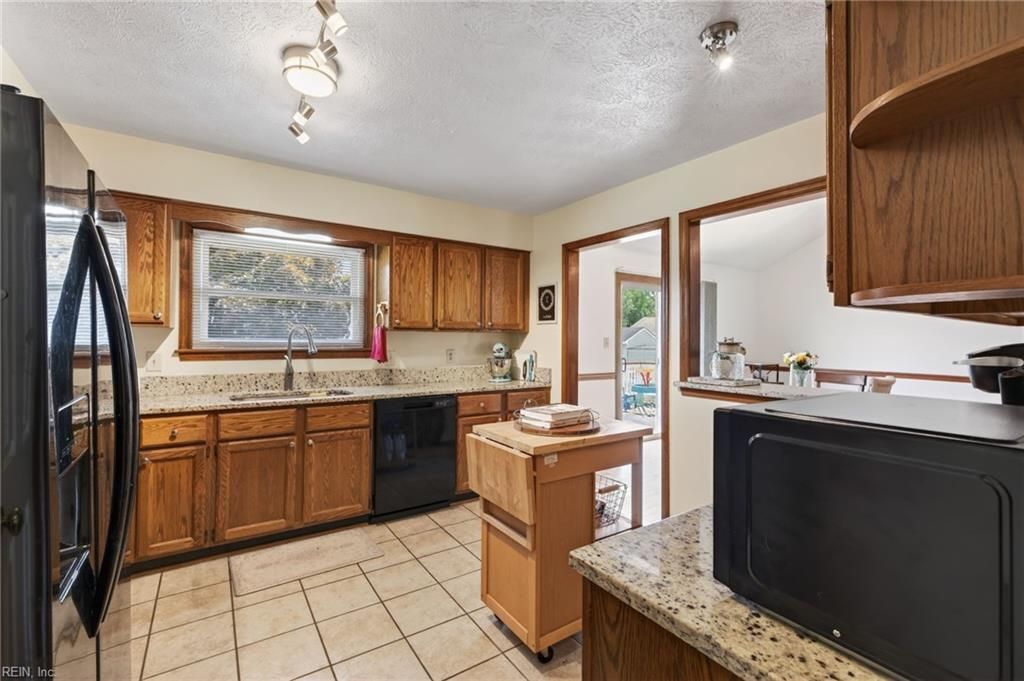 Photo of 401 Cannon Drive, Carrollton, VA 23314 (MLS # 10632196)